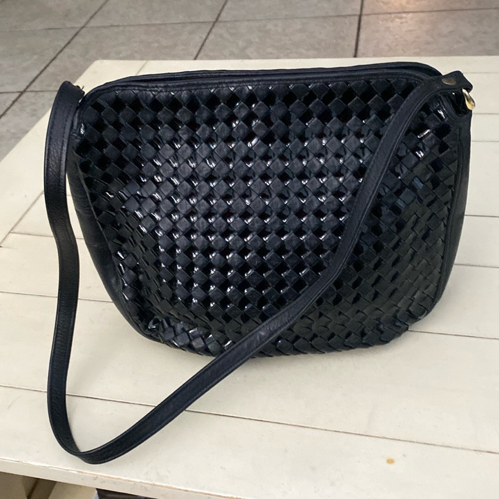 Aspect leather shoulder bag. Woven leather & patent leather.